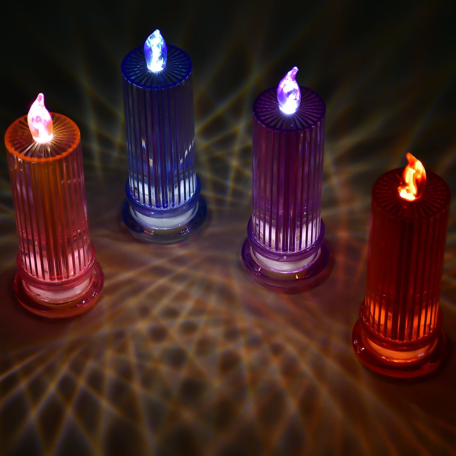 Large multicolor candles with a sparkling crystal finish, ideal for enhancing table settings.